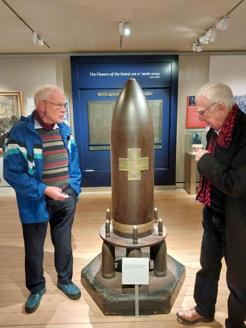 David Chambers and Ian Carter inspecting the Queen Street collecting shell in the National Museum of scotland.