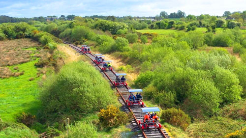 Velorail railbikes in use in the countryside